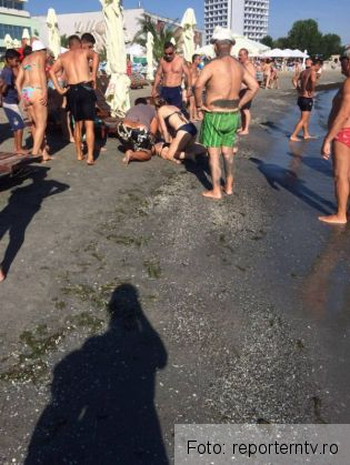Turistă resuscitată pe plajă! (FOTO) 3 turista resuscitare_216154.jpg