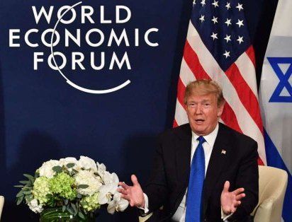 Un vehicul din convoiul lui Donald Trump a lovit un poliţist, la Davos 1 trump2_2.jpg