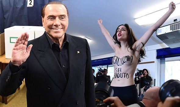 O activistă topless a protestat faţă de Berlusconi 1 italian-election.jpg