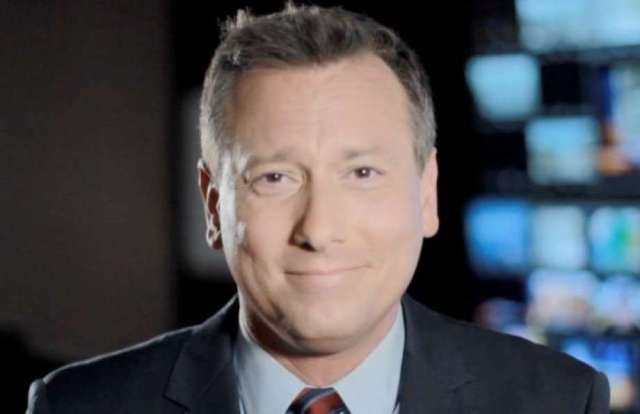 Un celebru prezentator de știri a fost găsit mort într-o cameră de hotel 1 chrisburrous.jpg